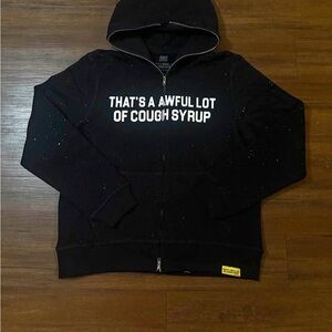 Black Hoodie with Bold White Text